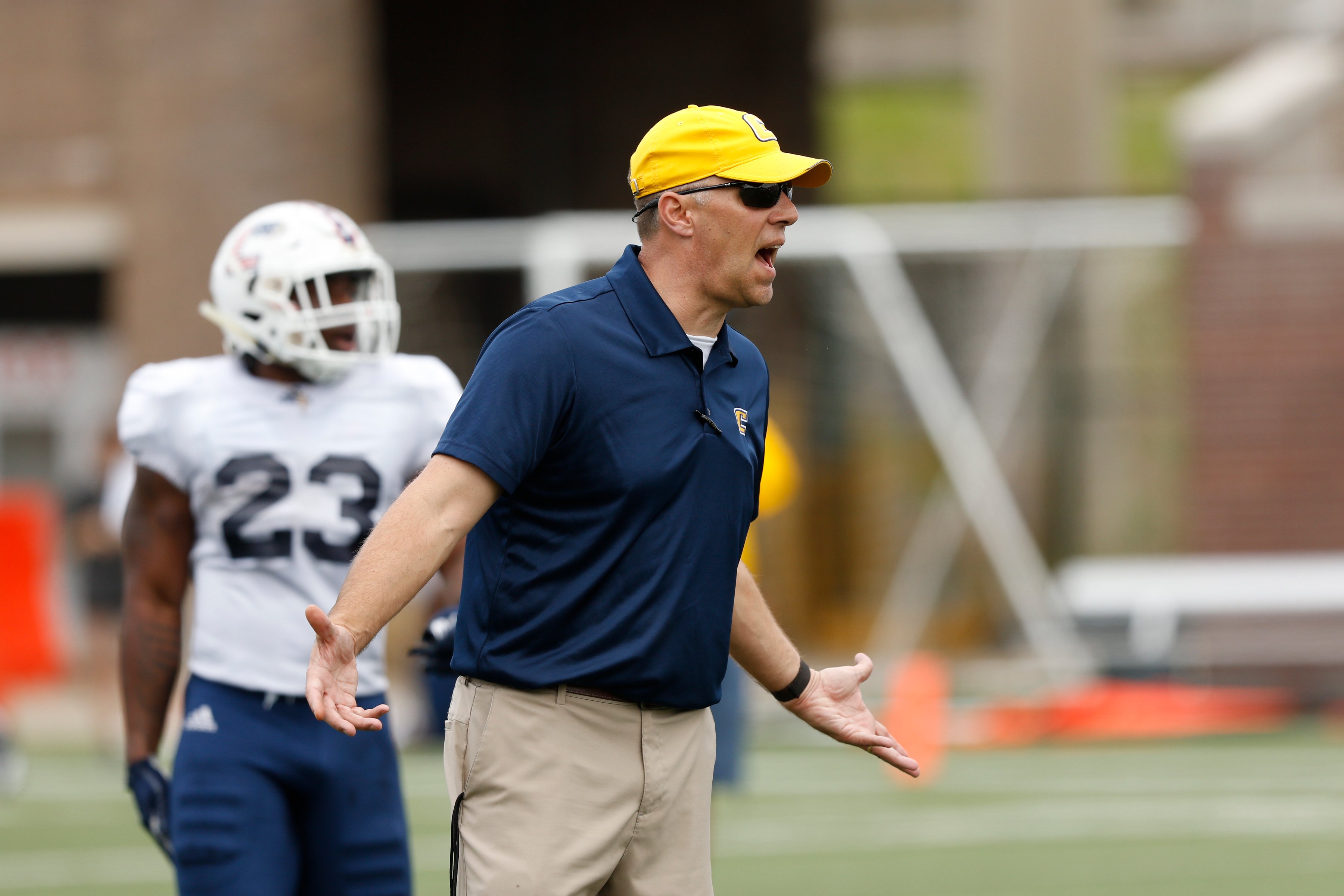 Chattanooga head football coach Rusty Wright shouts to players during the University of Tennessee at Chattanooga spring football scrimmage at Finley Stadium on Saturday, March 30, 2019, in Chattanooga, Tenn.