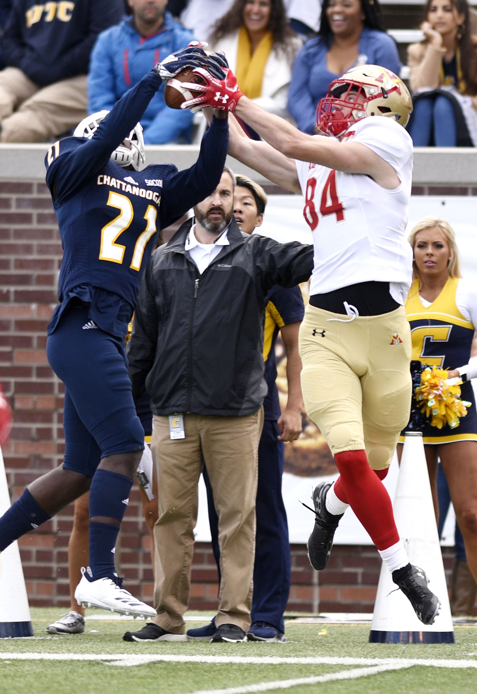 UTC's D.J. Jackson (21) breaks up a pass intended for VMI's Jakob Herres (84). The University of Tennessee at Chattanooga Mocs hosted the Virginia Military Institute Keydets on October 27, 2018. Saturday was also the Mocs's homecoming game.