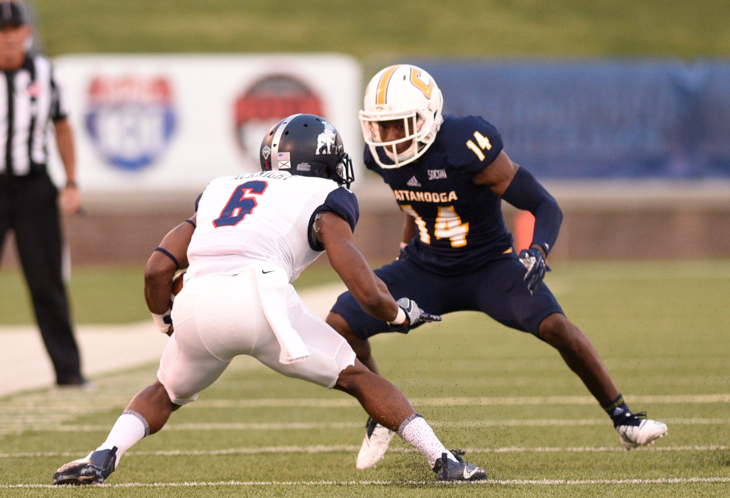 UTC defensive back Jordan Jones (14) covers Samford wide receiver Kelvin McKnight (6) during the Mocs' home football game against the Samford Bulldogs at Finley Stadium on Saturday, Sept. 22, 2018, in Chattanooga, Tenn.