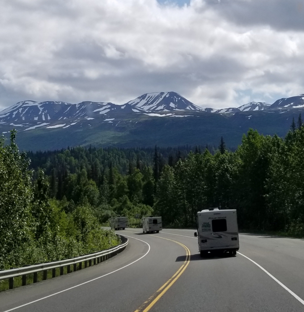 A caravan of RVs traverses the Richardson Highway between Anchorage and Mount Denali. / Photo by Patti Smith