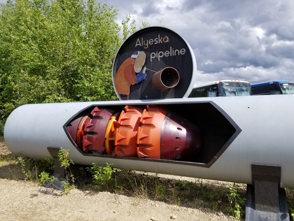 A cutaway view shows the 4-foot-diameter Alaska pipeline. The 800-mile pipeline from Prudhoe Bay to Valdez transports 500,000 barrels of oil a day. / Photo by Patti Smith