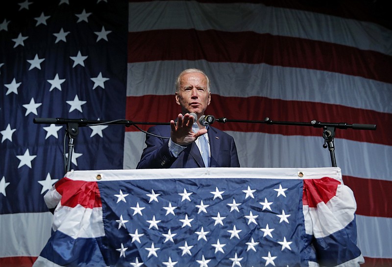 In this Aug. 9, 2019 photo, former Vice President and Democratic presidential candidate Joe Biden speaks at the Iowa Democratic Wing Ding at the Surf Ballroom, in Clear Lake, Iowa. As the U.S. economy flashes recession warning signs, Democratic presidential candidates are leveling pre-emptive blame on President Donald Trump. They argue that his aggressive and unpredictable tariff policies are to blame for gloomy economic forecasts. (AP Photo/John Locher)