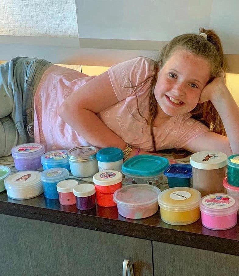 Raegan Willhoit displays her slime collection. / Contributed photo by Misty Willhoit