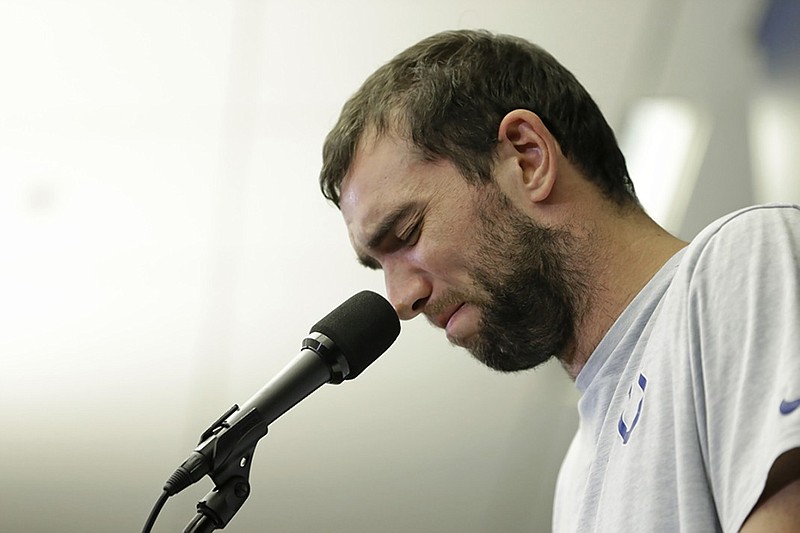 Indianapolis Colts quarterback Andrew Luck speaks Saturday night during an impromptu news conference announcing his retirement from football.