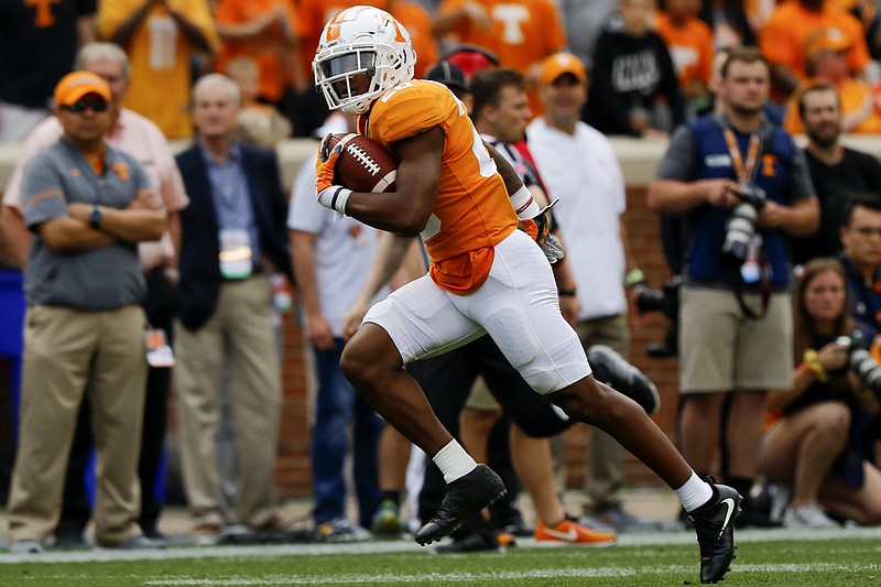 Staff photo by C.B. Schmelter / University of Tennessee defensive back Bryce Thompson (20) returns a kickoff during the Orange and White spring football game at Neyland Stadium on Saturday, April 13, 2019 in Knoxville, Tenn.