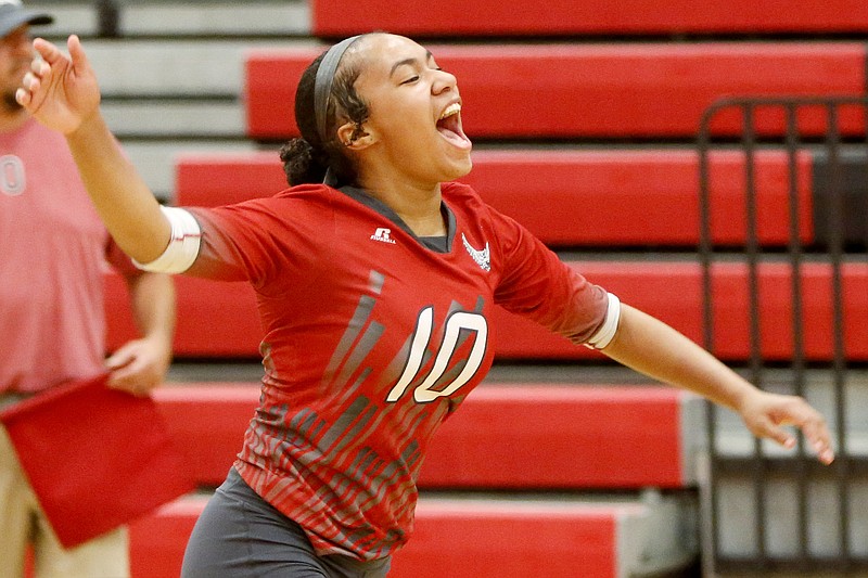 Ooltewah's Amya Sutton celebrates during the Lady Owls' 3-1 volleyball win Tuesday night against visiting Sale Creek.
