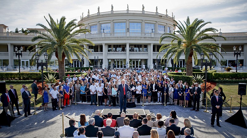 This photo from Tuesday, Oct. 25, 2016, shows then Republican presidential candidate Donald Trump speaking at a campaign event with employees at Trump National Doral in Miami. President Donald Trump was in full sales mode Monday, Aug. 26, 2019, doing everything but passing out brochures as he touted the features that would make the Doral golf resort the ideal place for the next G7 Summit _ close to the airport, plenty of hotel rooms, separate buildings for every delegation, even top facilities for the media. (AP Photo/Evan Vucci, File)