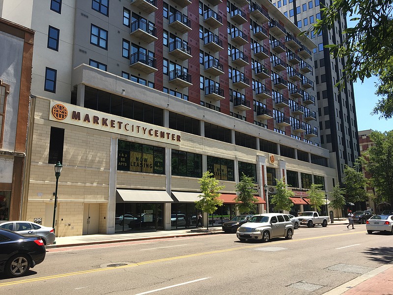 The city and county are moving to limit the property tax breaks previously granted to the Market City Center in the 700 block of Market Street after the facility changed 53 of its 125 apartment units to vacation rentals. / Staff photo by Dave Flessner