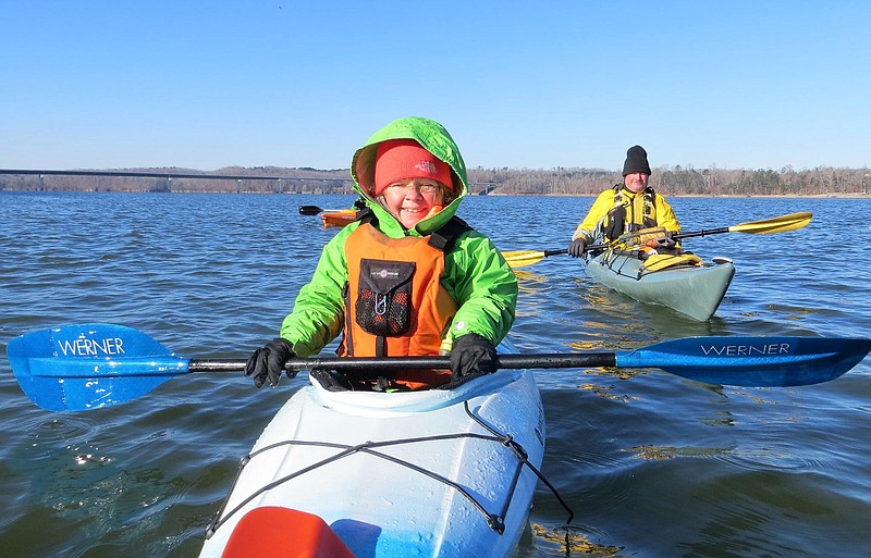 Photo by BG Smith / Sharon Stolberg and friend Ben Johnson paddle a frigid Hiwassee River.