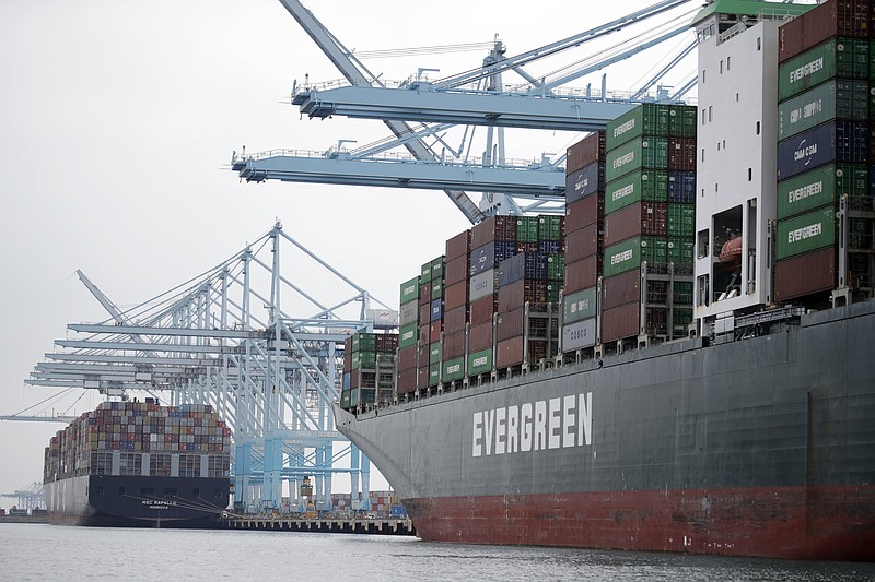 FILE - In this June 19, 2019, file photo cargo ships are docked at the Port of Los Angeles in Los Angeles. On Thursday, Aug. 29, the Commerce Department issues the second estimate of how the U.S. economy performed in the April-June quarter.(AP Photo/Marcio Jose Sanchez, File)