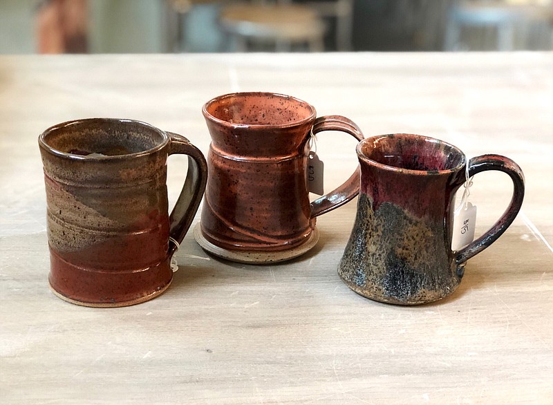 A selection of the inventory at the Mug Shop at Scenic City Clay Arts on East 11th Street. The new retail outlet will have its grand opening on Friday, Sept. 6.