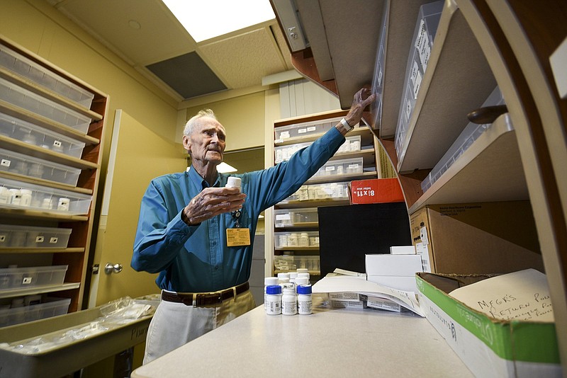 Roy Turley, 92, volunteers in the pharmacy at CHI Memorial in Chattanooga. Turley is the Volunteer award winner for Champions of Health Care.