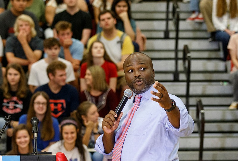 Staff photo by Doug Strickland / Hamilton County Schools Superintendent Bryan Johnson speaks to seniors at Ooltewah High School last week and announced that he will be donating his bonuses for Hamilton County's academic growth to a student scholarship fund.