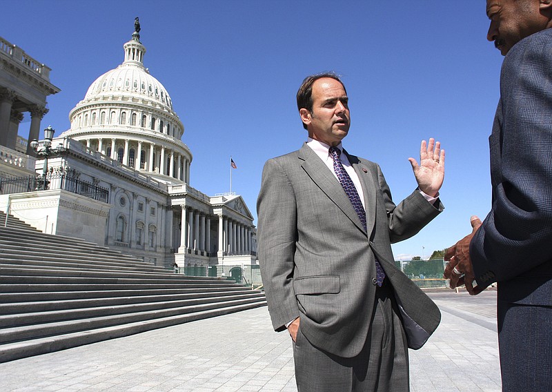 In this file photo, Rep. Zach Wamp, R-Tenn., talks with a reporter after voting Friday, Oct. 3, 2008, on Capitol Hill in Washington. (AP Photo/Lauren Victoria Burke)