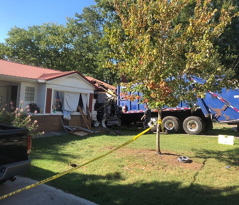 Photo from Cleveland TN Fire Department Facebook page / A house in Cleveland, Tennessee, was destroyed Thursday when a garbage truck crashed into it, according to the Cleveland TN Fire Department's Facebook page.