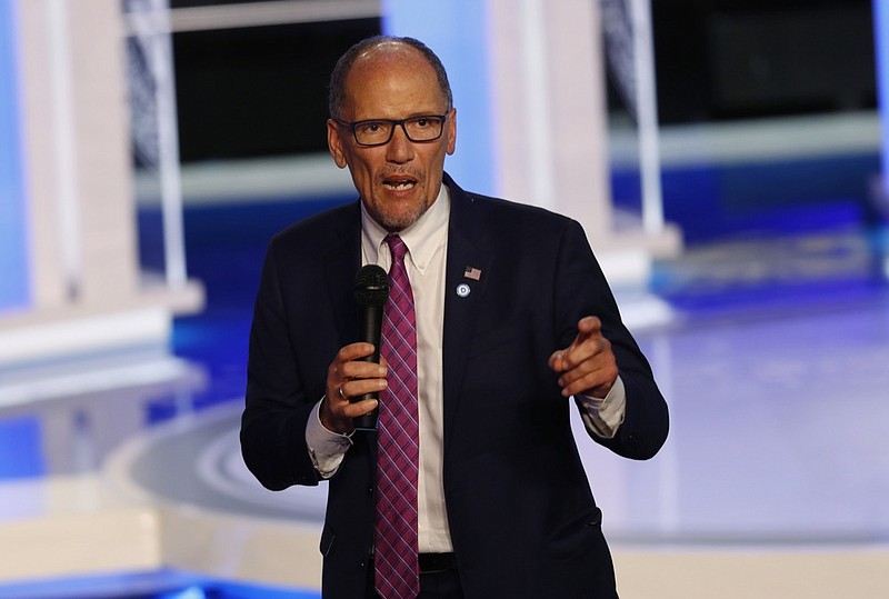 FILE - In this June 27, 2019 file photo, DNC Chair Tom Perez speaks before the start of a Democratic primary debate hosted by NBC News at the Adrienne Arsht Center for the Performing Arts, in Miami. The Democratic National Committee will recommend scrapping state plans to offer virtual, telephone-based caucuses in 2020 due to security concerns, sources tell The Associated Press on Thursday, Aug. 29, 2019. National party leaders, including Chairman Perez, have praised state parties for their efforts to work to expand participation. (AP Photo/Wilfredo Lee, File)


