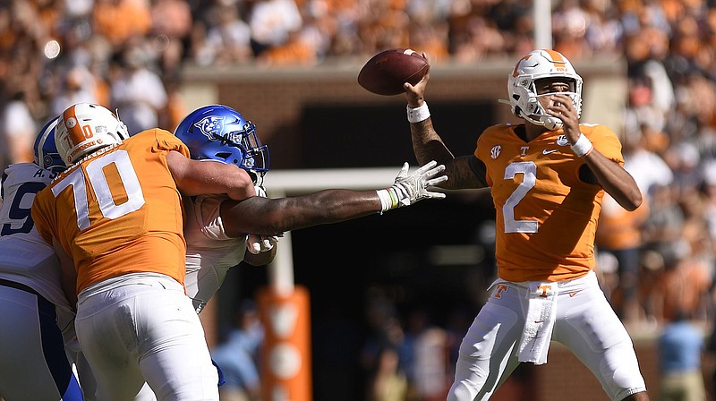 Staff Photo by Robin Rudd / Tennessee quarterback Jarrett Guarantano sets to throw as Ryan Johnson (70) blocks a Georgia State defender during Saturday's game at Neyland Stadium. Georgia State won 38-30.