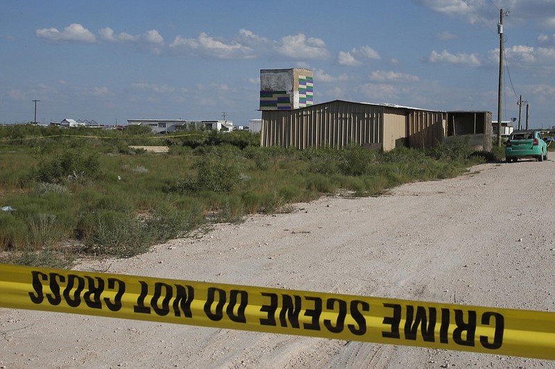 Crime scene tape still surrounds the home of Seth Ator, the alleged gunman in a West Texas rampage Saturday, on Monday, Sept. 2, 2019, near Odessa, Texas. (AP Photo/Sue Ogrocki)