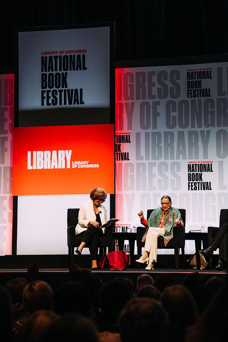 Photo by Elizabeth D. Herman of The New York Times/Justice Ruth Bader Ginsburg, right, during a panel discussion at the National Book Festival, hosted by the Library of Congress, at the Walter E. Washington Convention Center last Saturday.