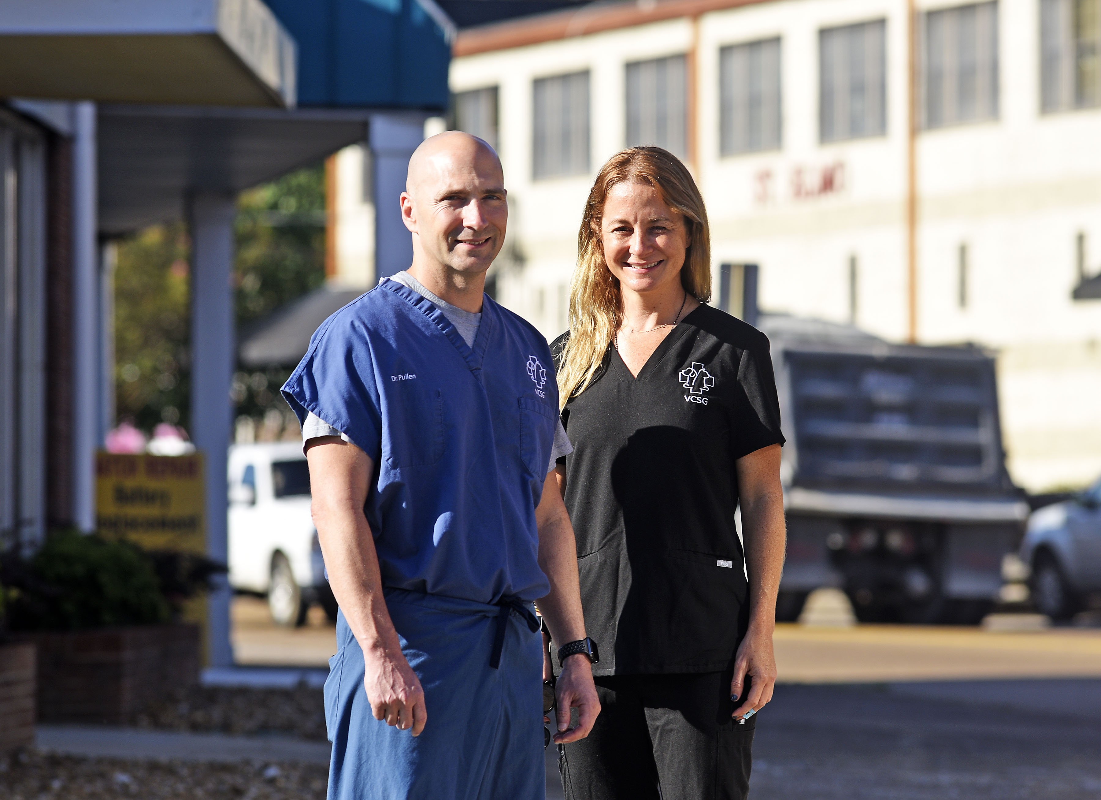 Staff Photo by Robin Rudd/ Dr. Billy Pullen and Claudia Pullen pose for a photograph outside the Tennessee Ave. office of Veterinary Care and Specialty Group. Claudia and Dr. Billy Pullen are moving the Veterinary Care and Specialty Group from Tennessee Ave to South Broad Street. The couple are planning various redevelopment projects in the St. Elmo area. The couple was photographed on August 30, 2019.
