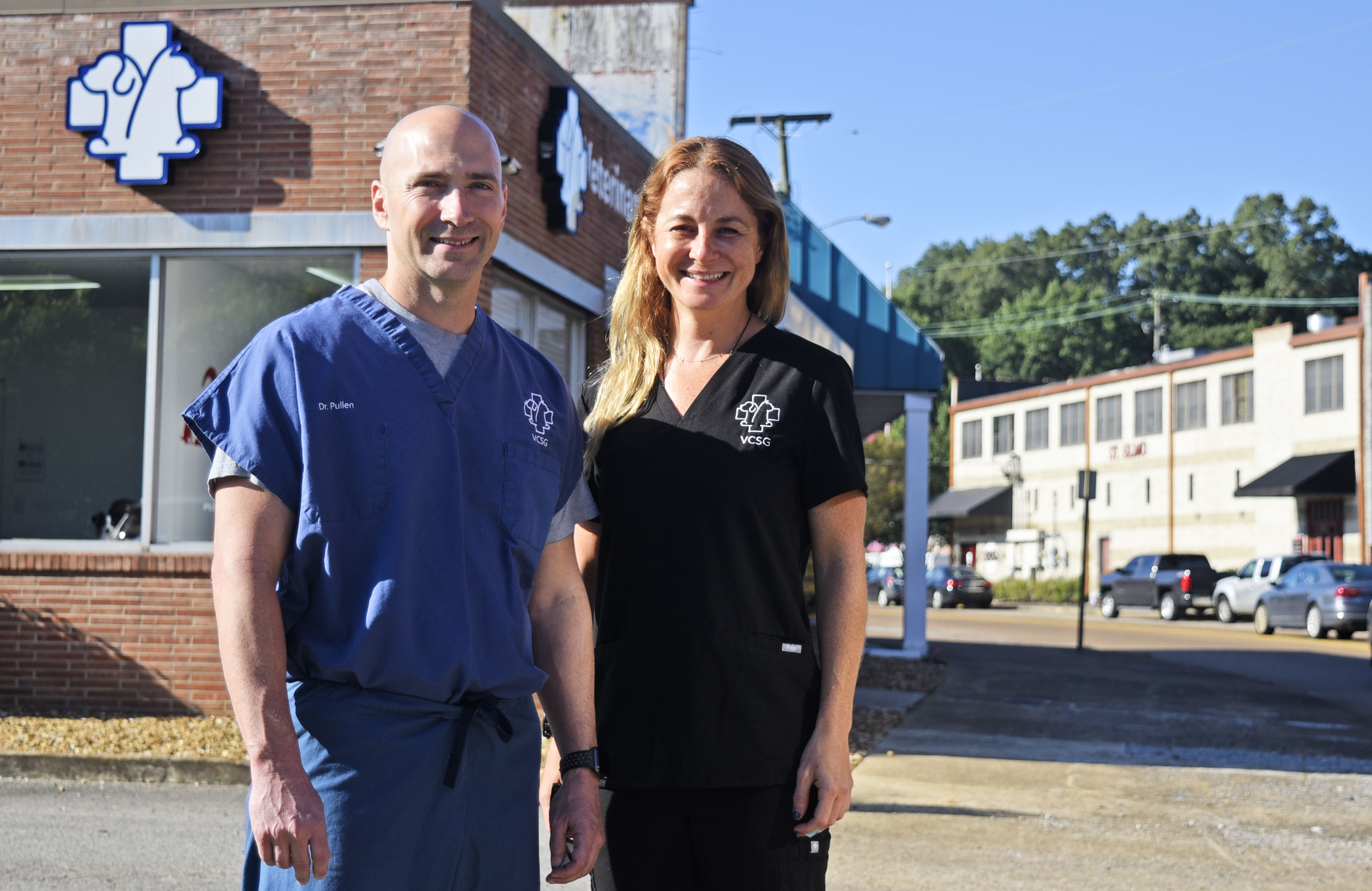 Staff Photo by Robin Rudd/ Dr. Billy Pullen and Claudia Pullen pose for a photograph outside the Tennessee Ave. office of Veterinary Care and Specialty Group. Claudia and Dr. Billy Pullen are moving the Veterinary Care and Specialty Group from Tennessee Ave to South Broad Street. The couple are planning various redevelopment projects in the St. Elmo area. The couple was photographed on August 30, 2019.