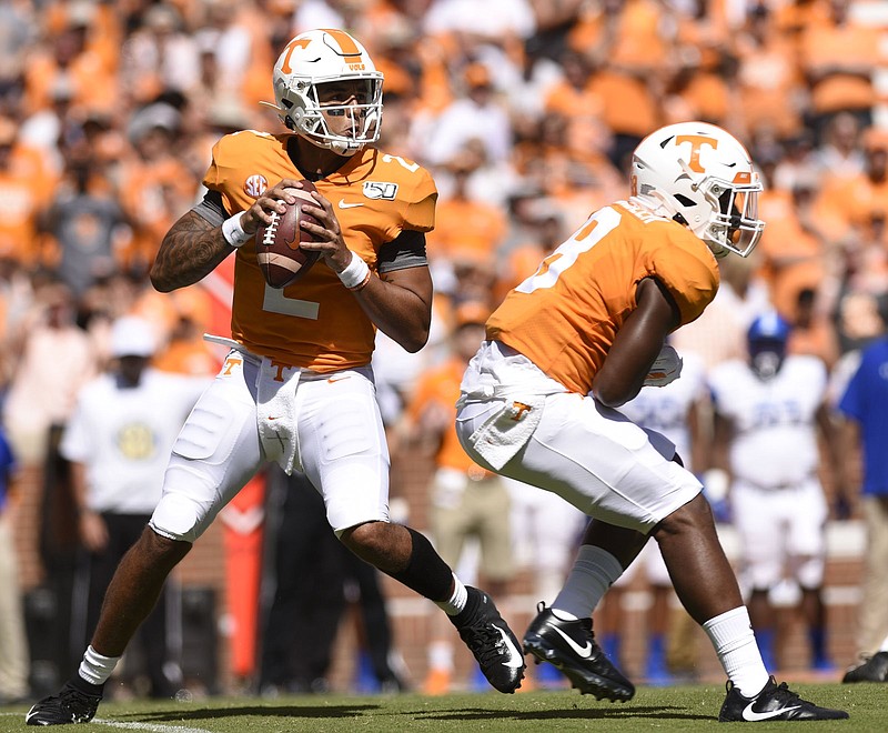 Staff Photo by Robin Rudd / Tennessee quarterback Jarrett Guarantano drops back to pass while running back Ty Chandler blocks against Georgia State during the season opener for both teams last Saturday at Neyland Stadium in Knoxville.
