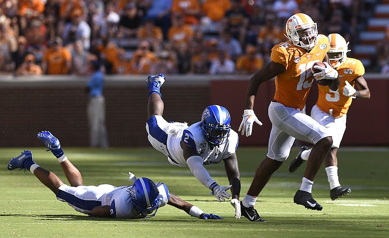 Staff Photo by Robin Rudd / Tennessee wide receiver Jauan Jennings eludes two Georgia State defenders last Saturday at Neyland Stadium in Knoxville.