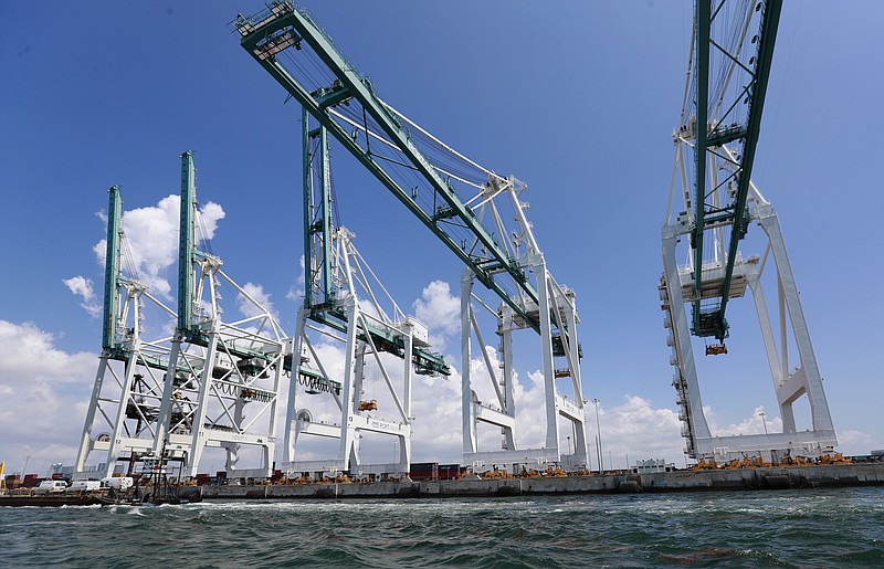 In this July 24, 2019, photo, large cranes to unload container ships are shown at PortMiami in Miami. On Thursday, Sept. 5, the Labor Department issues revised data on productivity in the second quarter. (AP Photo/Wilfredo Lee)