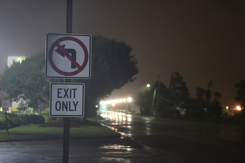 Rains and wind pelt Charleston, S.C., early on the morning of Thursday, Sept. 5, 2019, as Hurricane Dorian enters the area. Hurricane Dorian has begun raking the Southeast U.S. seaboard, threatening to inundate low-lying coasts from Georgia to southwest Virginia with a dangerous storm surge after its deadly mauling of the Bahamas. (AP Photo/Meg Kinnard)