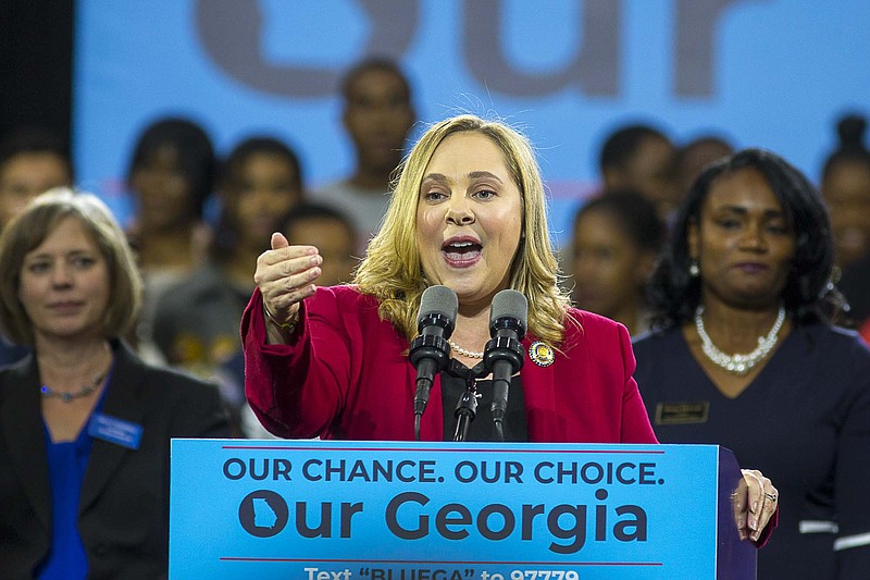 FILE - In a Friday, Nov. 2, 2018 file photo, Sarah Riggs Amico speaks during a rally for Democratic gubernatorial candidate Stacey Abrams, at Morehouse College in Atlanta. Business executive and 2018 candidate for lieutenant governor Sarah Riggs Amico announced her candidacy for the U.S. Senate Tuesday, August 27, 2019.  (Alyssa Pointer/Atlanta Journal-Constitution via AP, File)