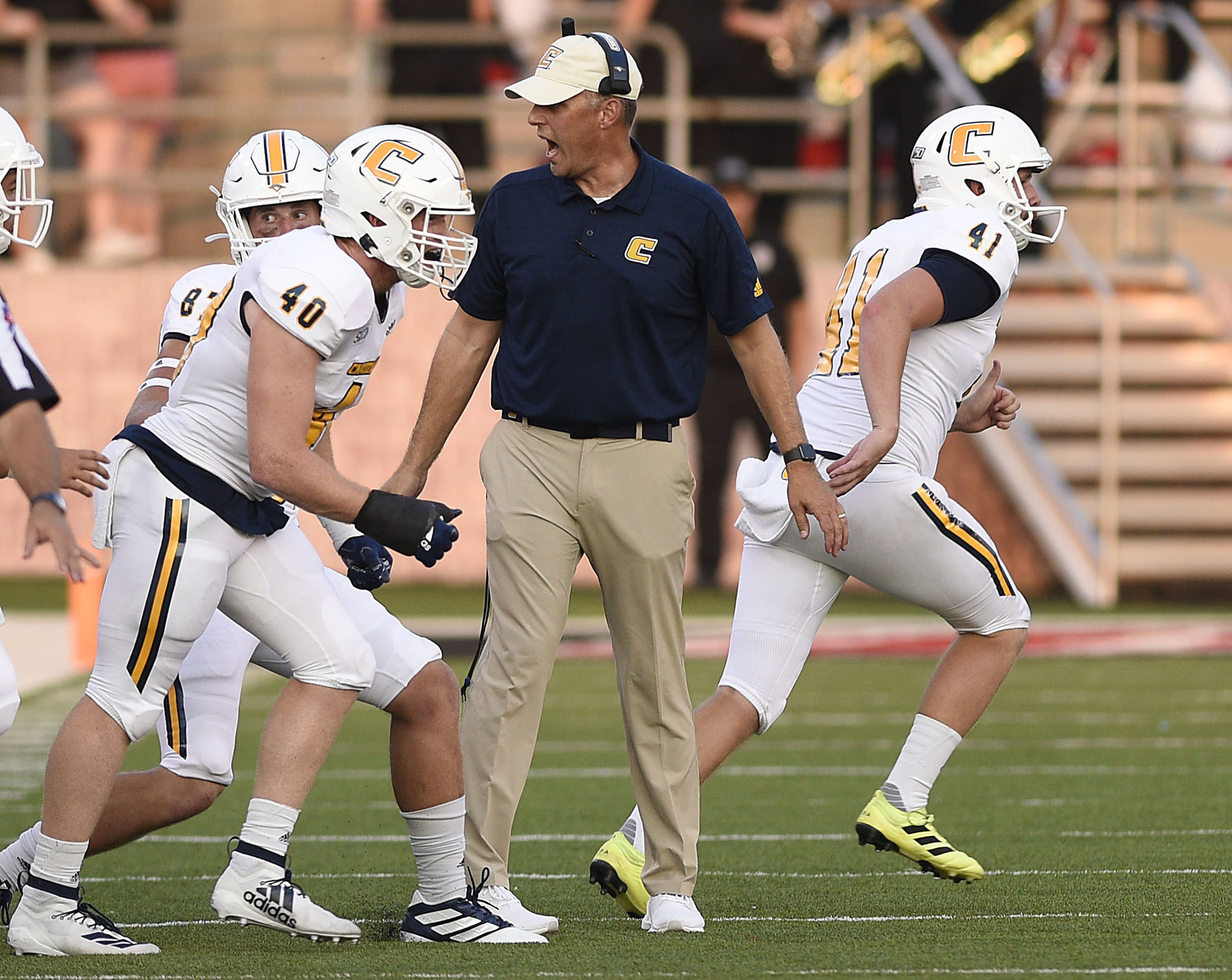 Staff Photo by Robin Rudd/ UTC head coach Rusty Wright encourages the punt team as they take the field. The University of Tennessee Chattanooga Mocs visited the Jacksonville State Gamecocks in NCAA football action on September 7, 2019.
