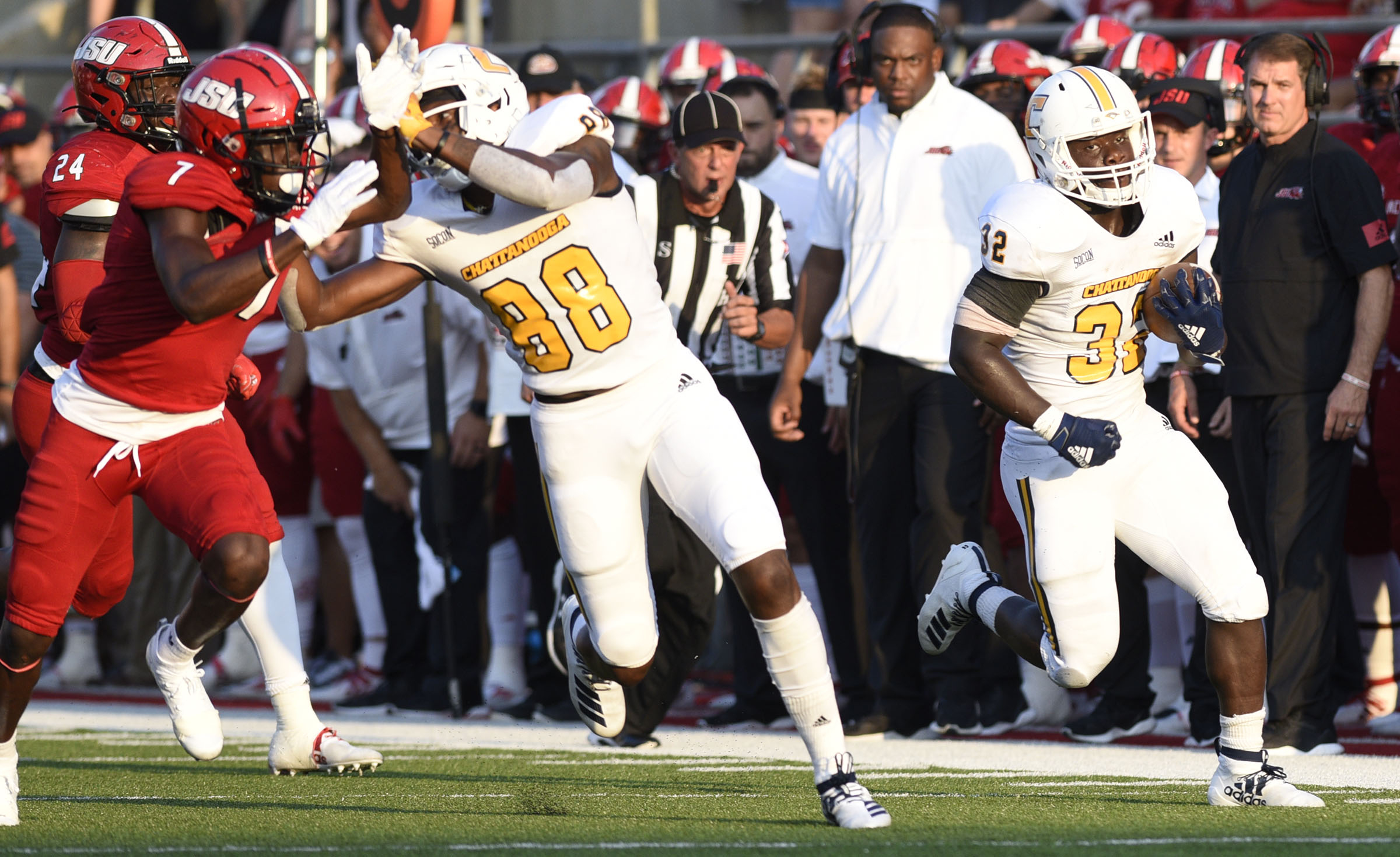 Staff Photo by Robin Rudd/ UTC's Ailym Ford (32) breaks a long run behind the blocking of Juwan Tyus (88). The University of Tennessee Chattanooga Mocs visited the Jacksonville State Gamecocks in NCAA football action on September 7, 2019.