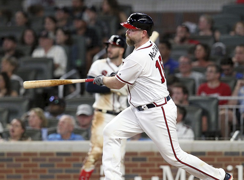 Atlanta Braves Catcher Brian McCann looks on during the game