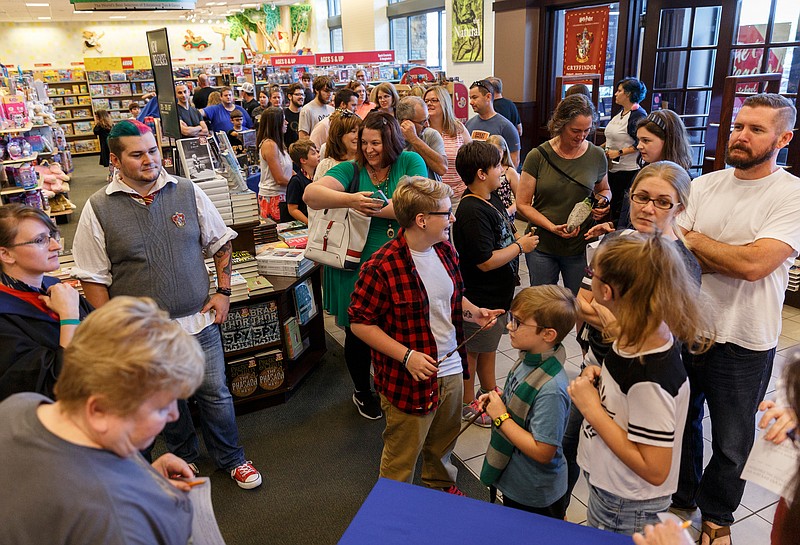 Staff File Photo / Fans line up for a Harry Potter celebration to benefit the Soddy-Daisy Community Library at Barnes and Noble Books in 2018, which marked the 20th anniversary of the J.K. Rowling series.