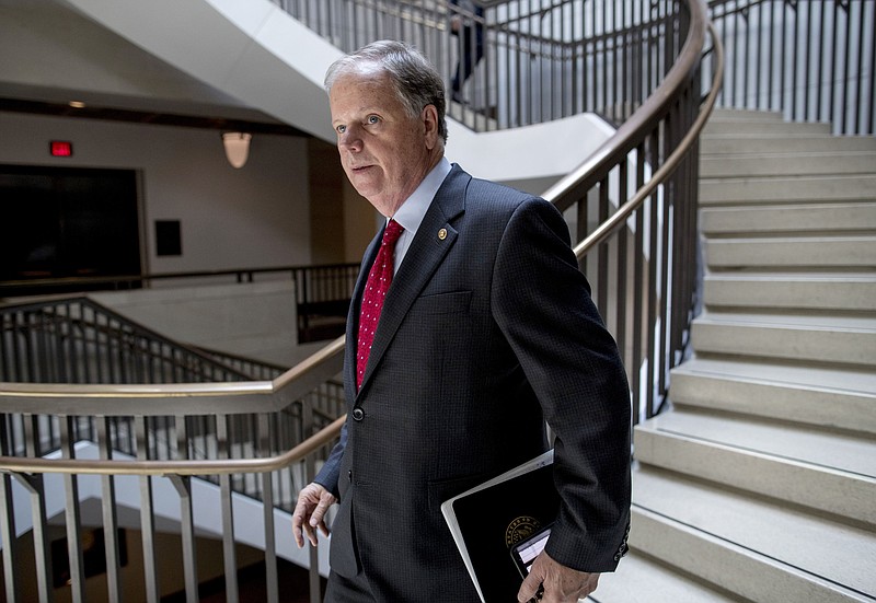 In this July 10, 2019, file photo, Sen. Doug Jones, D-Ala., arrives for a closed door meeting for Senators on election security on Capitol Hill in Washington. Jones, a Democrat who pulled off a stunning political upset in Alabama two years ago, launched his reelection bid Sunday, Sept. 8, seeking to create another Deep South victory in a Republican-dominated state. (AP Photo/Andrew Harnik, File)