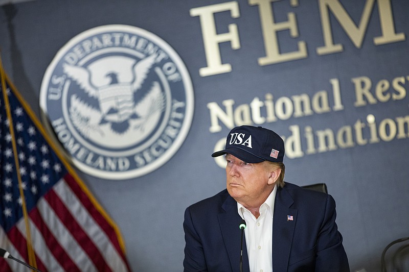 FILE -- President Donald Trump during a briefing on Hurricane Dorian at Federal Emergency Management Agency headquarters in Washington, Sept. 1, 2019. The Secretary of Commerce threatened to fire top employees at NOAA on Friday after the agency’s Birmingham office contradicted President Trump’s claim that Hurricane Dorian might hit Alabama, according to three people familiar with the discussion. (Samuel Corum/The New York Times)