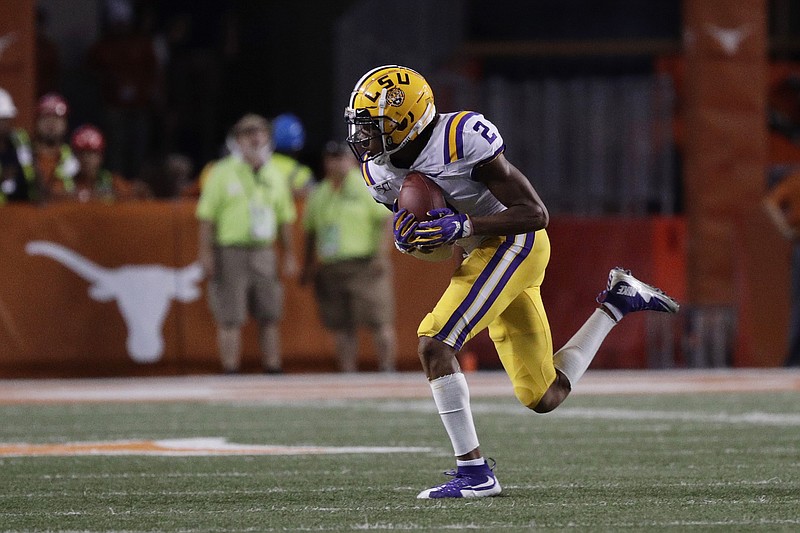 LSU wide receiver Justin Jefferson (2) catches a pass and runs for a touchdown against Texas during the second half of an NCAA college football game Saturday, Sept. 7, 2019, in Austin, Texas. (AP Photo/Eric Gay)