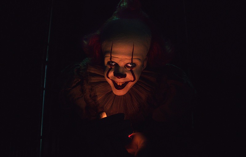 This image released by Warner Bros. Pictures shows Bill Skarsgard as Pennywise in New Line Cinema's horror thriller "It: Chapter 2." (Warner Bros. Pictures via AP)