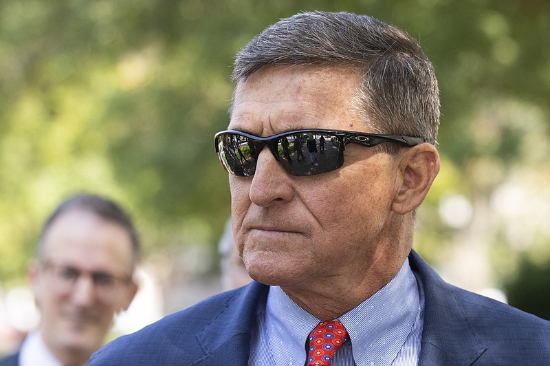 Michael Flynn, President Donald Trump's former national security adviser, leaves the federal court following a status conference with Judge Emmet Sullivan, in Washington, Tuesday, Sept. 10, 2019. (AP Photo/Manuel Balce Ceneta)