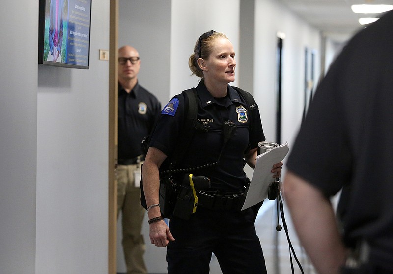Staff photo by Erin O. Smith / Chattanooga police Lt. Heather Williams leaves an interdepartmental meeting Wednesday, September 11, 2019 at the Chattanooga Police Service Center in Chattanooga, Tennessee. As a lieutenant, Williams spends a lot of time on administrative duties, including paperwork, running to-and-from meetings, advising subordinates as well as community and interdepartmental outreach. 