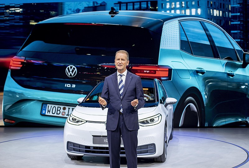 CEO of Volkswagen Herbert Diess introduces the new VW ID.3 at the IAA Auto Show in Frankfurt, Germany, Monday, Sept. 9, 2019. (AP Photo/Michael Probst)