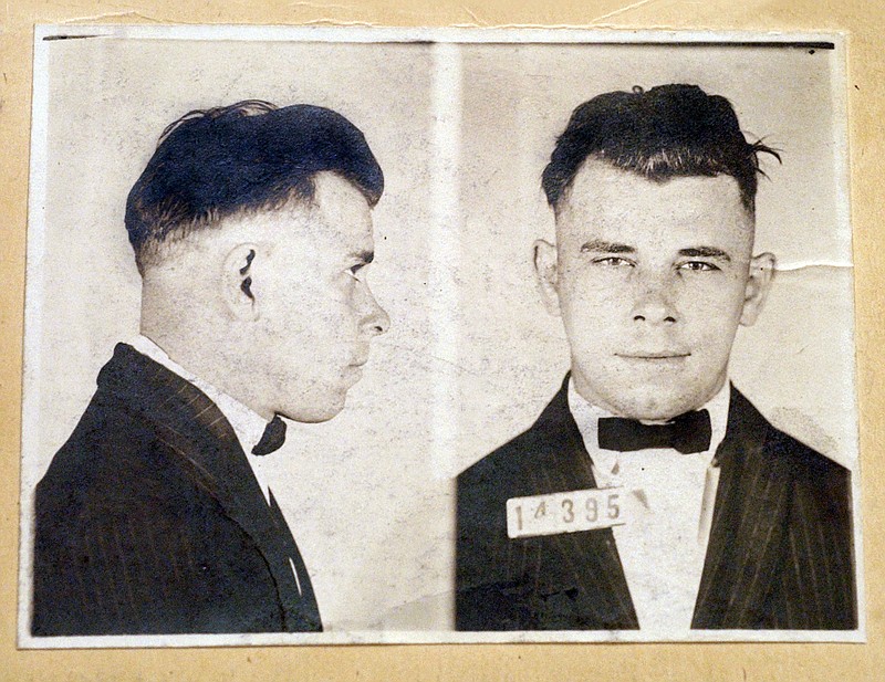 FILE - This file photo shows Indiana Reformatory booking shots of John Dillinger, stored in the state archives. The History Channel has dropped out of a planned documentary on John Dillinger that would have included the exhumation of the 1930s gangster's Indianapolis gravesite. A&E Networks spokesman Dan Silberman says The History Channel is no longer involved in the Dillinger documentary. Silberman says the network won't comment on why it has withdrawn from the project. The planned exhumation of Dillinger's grave is the subject of a lawsuit. (Indiana State Archives/The Indianapolis Star via AP, File)