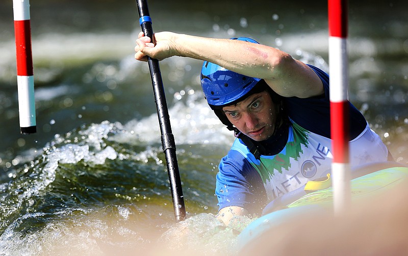 Staff photo by Erin O. Smith / Tad Dennis navigates through gates on the Upper Ocoee during the second annual Ocoee River Championships Friday, Sept. 13, 2019 in Copperhill, Tennessee. The Ocoee River Championships is a three-day whitewater competition and festival held on the Ocoee River in the Cherokee National Forest.