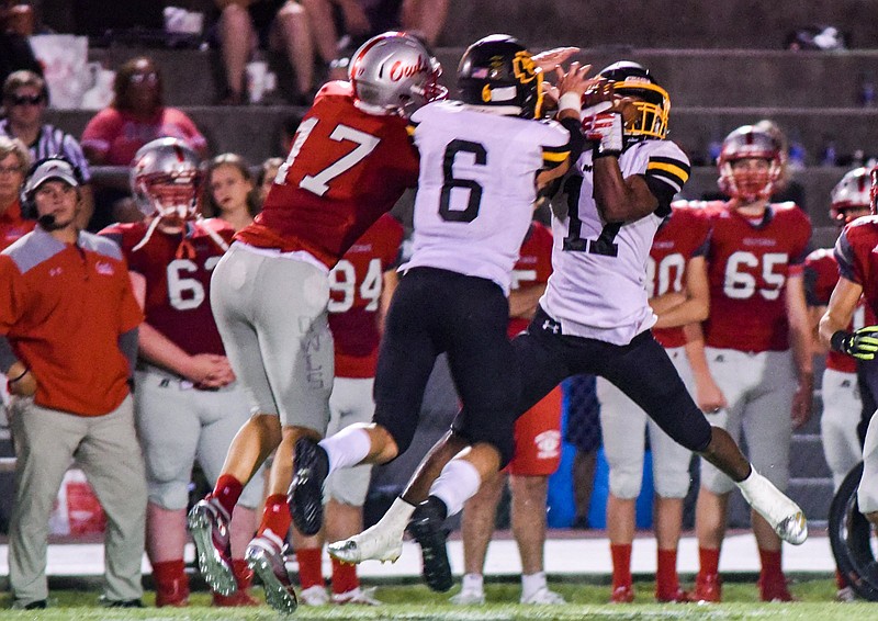 Photo by Cade Deakin/ McMinnճ Jalen Hunt (17) intercepts a pass during the first half. The McMinn County Cherokees visited the Ooltewah Owls in TSSAA football action on September 13, 2019.