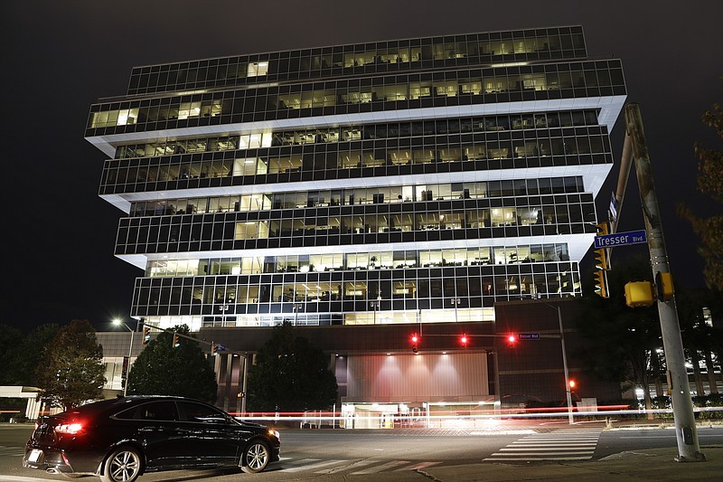 Cars pass Purdue Pharma headquarters Thursday, Sept. 12, 2019, in Stamford, Conn. For months, the judge overseeing national litigation over the opioids crisis urged all sides to reach a settlement that could end thousands of lawsuits filed by state and local governments. But the chaotic developments this week in the case against OxyContin maker Purdue Pharma underscore how difficult that goal is. (AP Photo/Frank Franklin II)