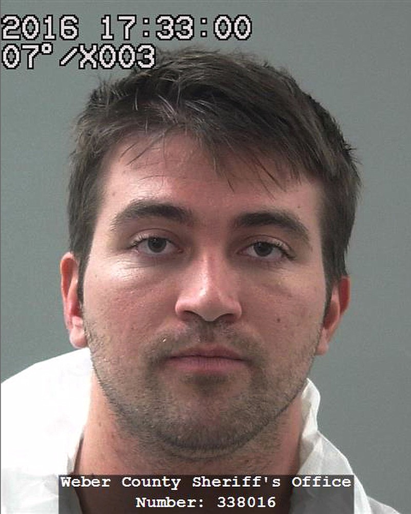 **HOLD AND MOVE WITH STORY**FILE - This file booking photo provided by the Weber County Sheriff's Office shows Aaron Michael Shamo. Shamo built a multimillion-dollar fentanyl trafficking empire from his computer with a few millennial friends. The case prosecutors brought against him reveals the ease with which the drug that has killed tens of thousands now moves around the world: powder up to 100 times stronger than morphine was bought online from China, shaped into replicas of oxycodone in Shamo’s basement, resold on the internet’s black markets and mailed to thousands. (Weber County Sheriff's Office via AP, File)