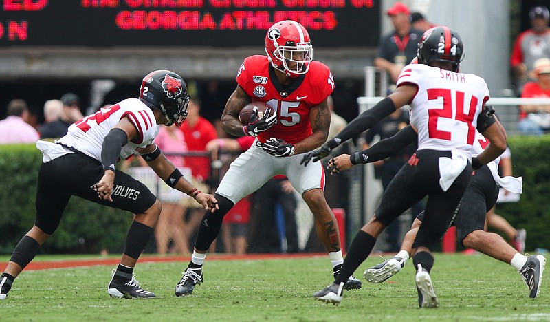 Georgia photo by Chamberlain Smith / Georgia senior receiver Lawrence Cager, who had a touchdown reception and several key blocks during Saturday's win over Arkansas State, is among the many Bulldogs who are eager for this week's showdown against visiting Notre Dame.