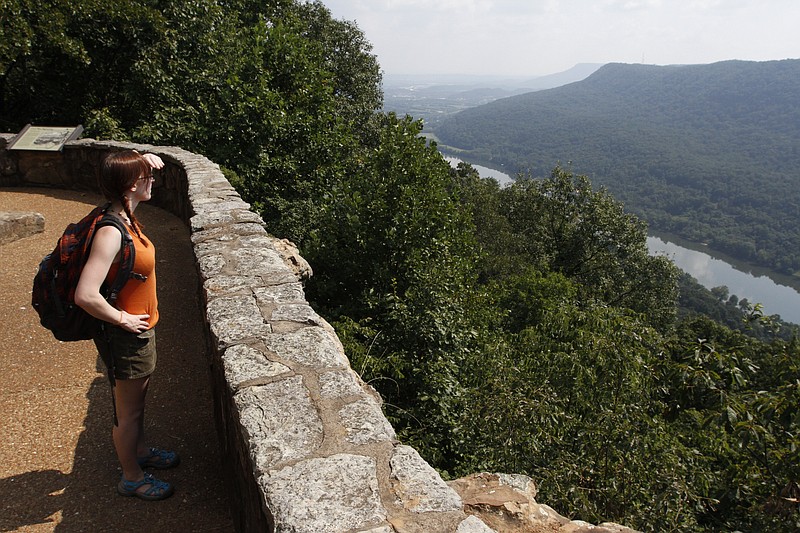 Staff Photo by Dan Henry / Erin Ling looks out over the Tennessee River before hiking on the Cumberland Trail at Signal Point Park atop Signal Mountain in 2013. Ling moved to the area from Athens, Georgia. 