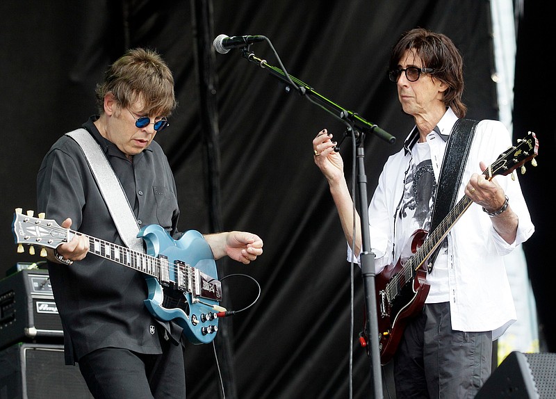 In this Aug. 7, 2001, file photo, The Cars lead singer Ric Ocasek, right, guitar Elliot Easton perform during the Lollapalooza music festival at Grant Park in Chicago. Boston-based The Cars, who combined New Wave and classic rock sounds, will be inducted to the Rock and Roll Hall of Fame on April 14, 2018 in Cleveland, Ohio. (AP Photo/Nam Y. Huh, File)