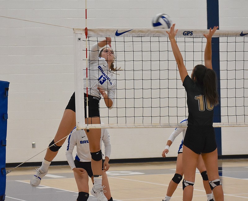 Staff photo by Patrick MacCoon / GPS's Ansley Blevins hits the ball during a 3-0 sweep of Silverdale Baptist Academy on Monday night.